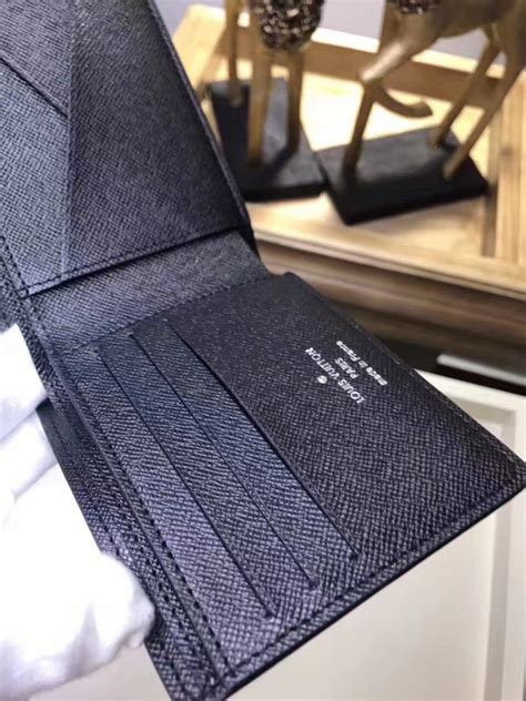 louis vuitton multiple wallet m30952|Louis Vuitton M30952 Taiga Portefeuille Multiple Fold Wallet.